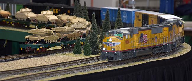 UP freight passing Joe Lupinski's military flats - Springfield 2017